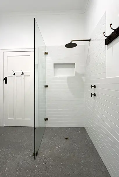 Frameless Glass Shower Screen with Brushed Brass Hardware - Bathroom Renovation